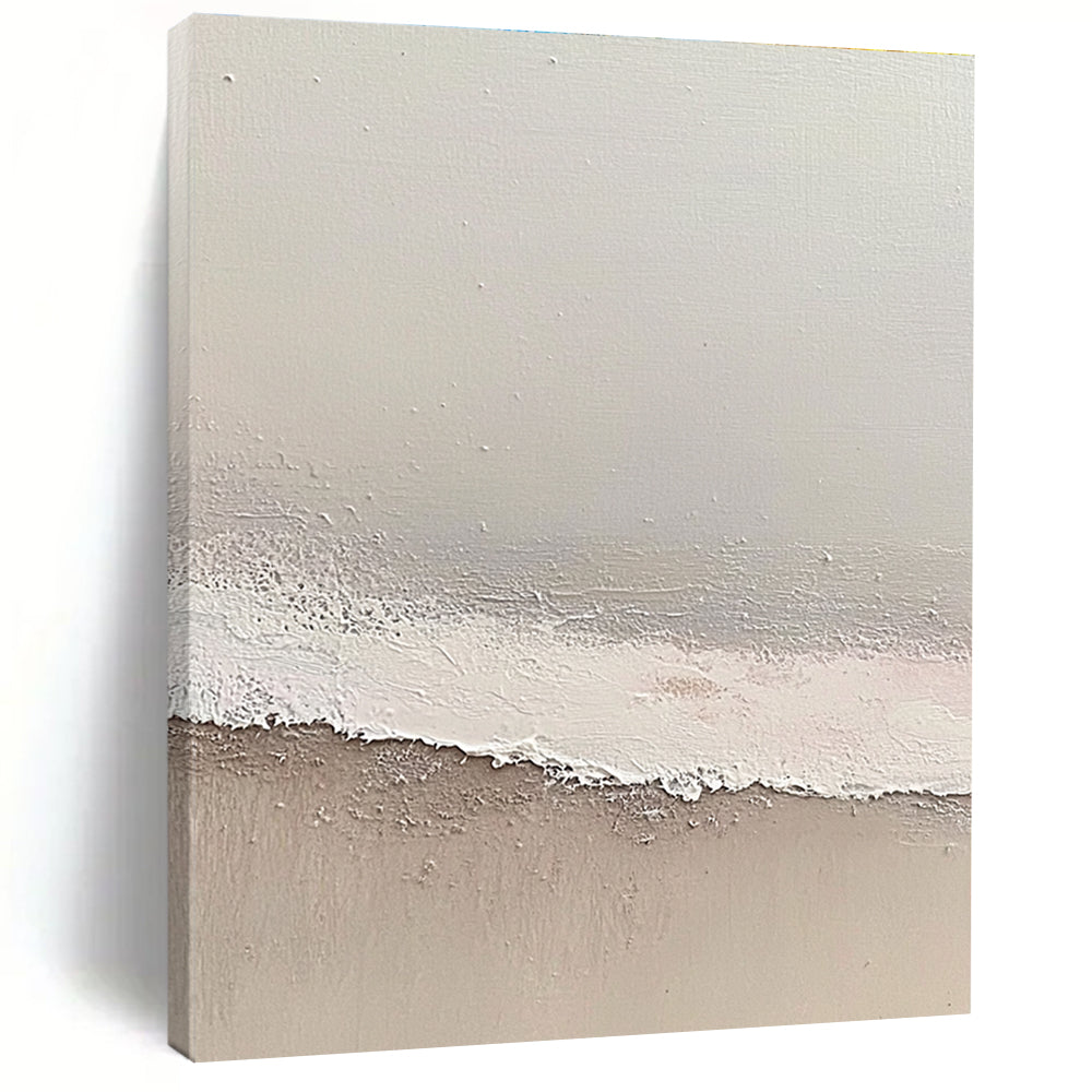 Large abstract painting depicting a serene beach scene with soft gray and pale pink tones featuring gentle waves and textured surfaces.STSC1427