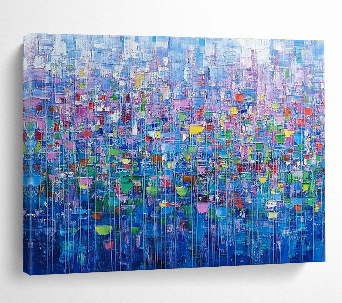 Large abstract painting of an urban landscape created with colorful squares and lines resembling small flowers in vibrant shades.SC474