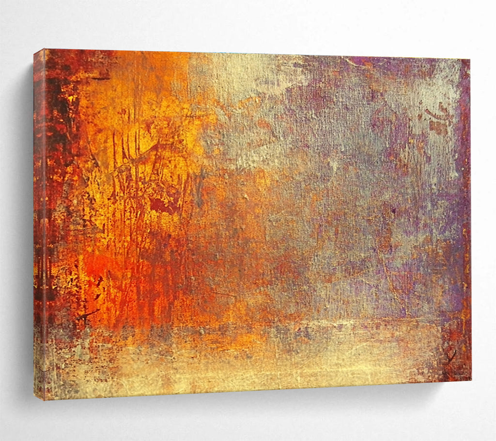 A large abstract painting featuring warm tones of gold reds and oranges evokes autumn's energy and symbolizes life's transitions with a golden sunset backdrop.SC432