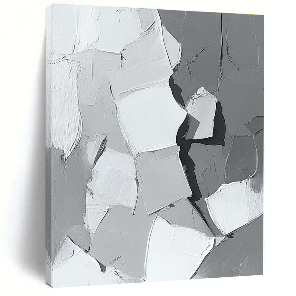 Large abstract painting in gray and white showcasing body parts in armor with bold brush strokes and thick paint application in a striking monochrome palette.STSC479