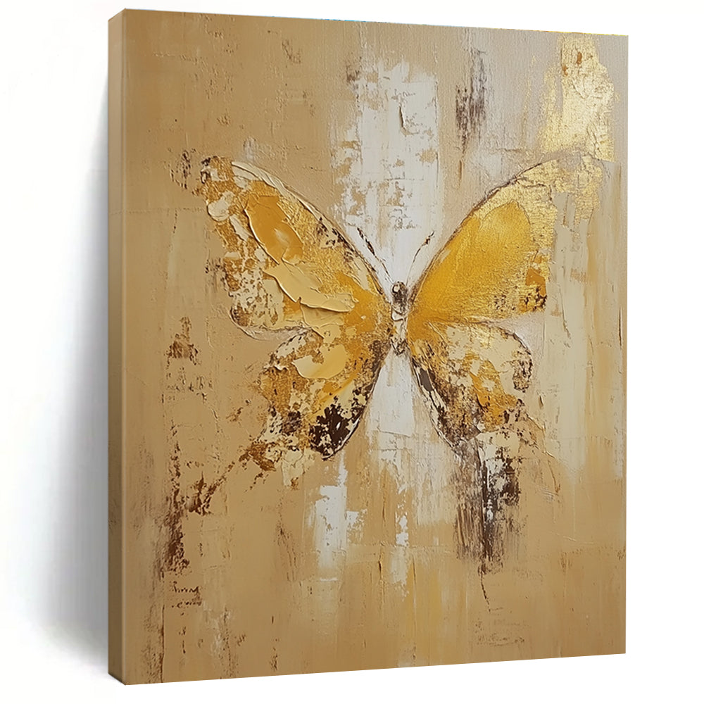 Large abstract painting of a butterfly in light yellow and beige tones with gold leaf and textured oil on canvas.STSC252