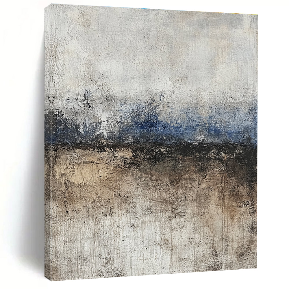 Large abstract painting featuring soft edges and subtle color transitions of beige blue-gray and brown with a path leading to tranquil water.STSC125