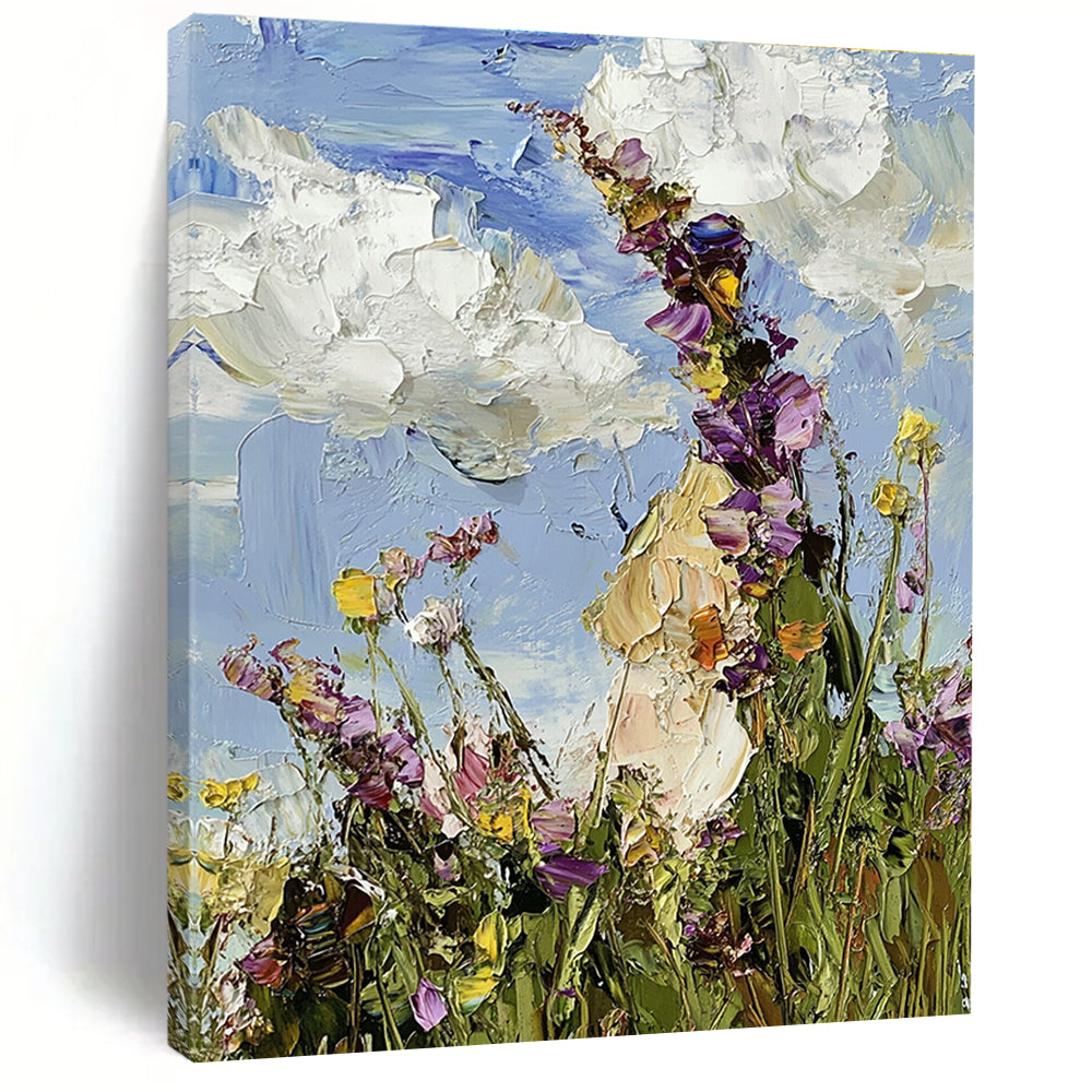 Large abstract oil painting featuring a colorful wildflower meadow under a blue sky with visible brushstrokes in an impressionist style.STSC1367