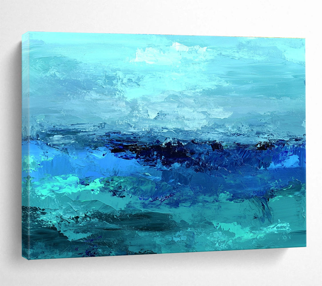 Large abstract ocean artwork in shades of aqua teal and navy with textured layers suggesting waves evokes tranquility and depth on canvas.SC035