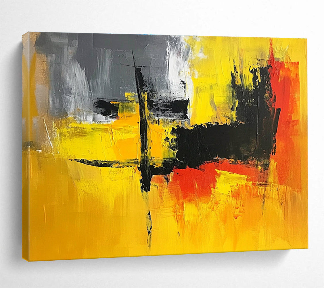 A large abstract painting featuring vibrant yellow, grey, and black hues, perfect for enhancing any contemporary space.SC393