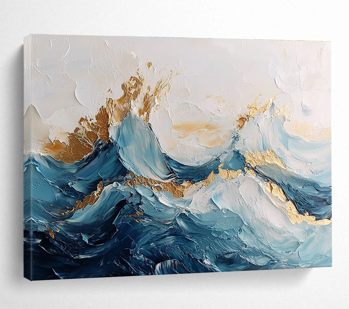 Large abstract painting of ocean waves in blue and white with gold accents featuring textured brush strokes and fluid shapes that convey movement.SC101