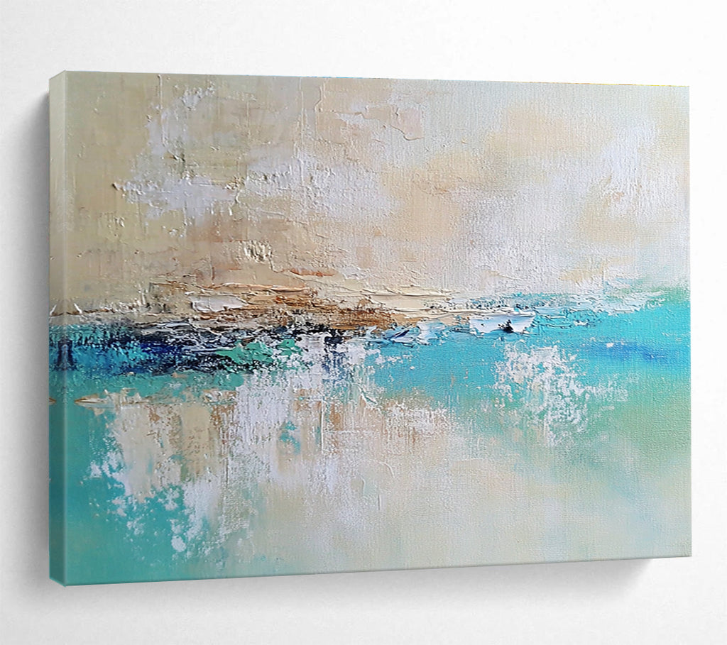 Large abstract painting of a calm sea featuring blue and green tones on a textured canvas with soft edges and neutral colors.SC340