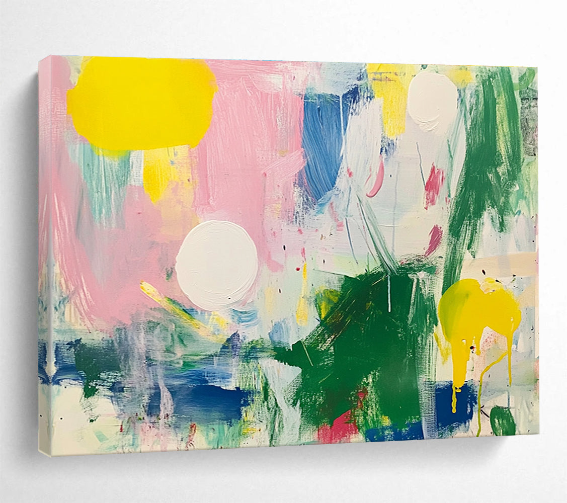Large abstract painting featuring bright colors with green and pink shapes white circles yellow lines blue lines and light red elements on a white background.SC231