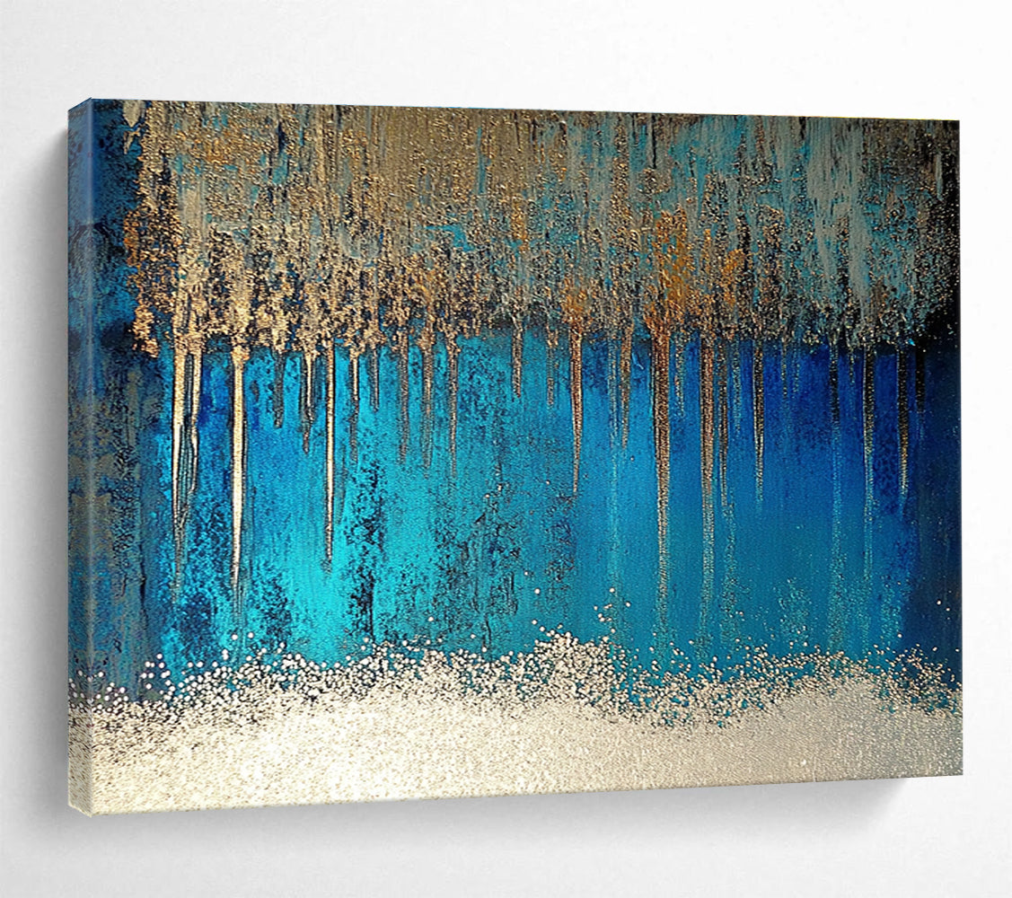 A large abstract painting featuring blue and silver patterns with glittering white sand and a rich brown liquid, accented by a thin silver line.SC346