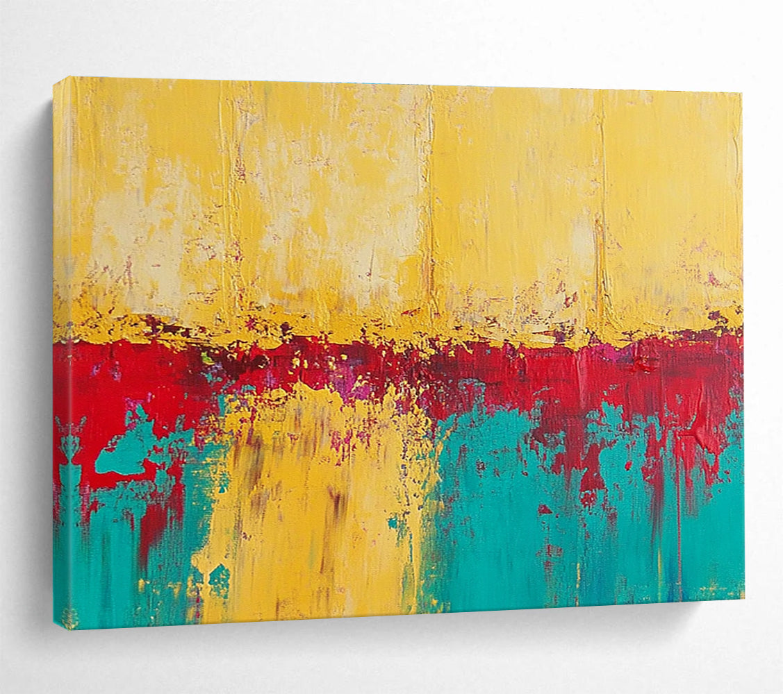 Large abstract painting featuring textured yellow sand with teal and red accents creating a vivid and captivating visual experience.SC269