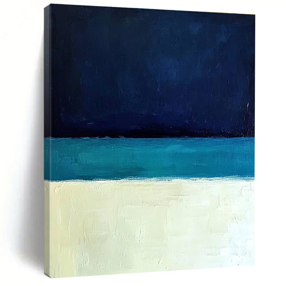 Large abstract painting featuring a minimalist ocean scene with blue tones white sand beach and a dark sky in Rothko style.STSC884