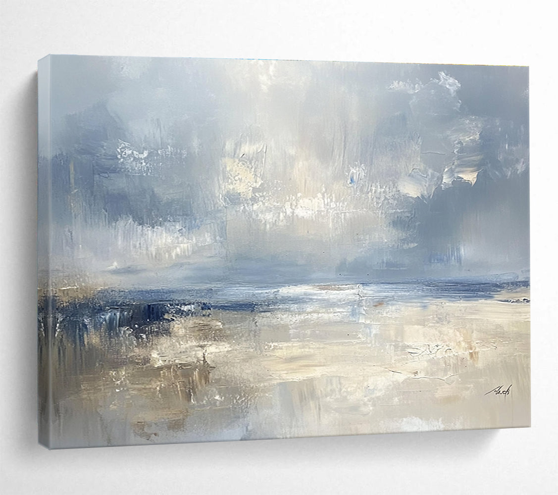 Large abstract seascape in cool blues and grays with warm beige accents capturing serene coastal beauty and a misty horizon.SC278