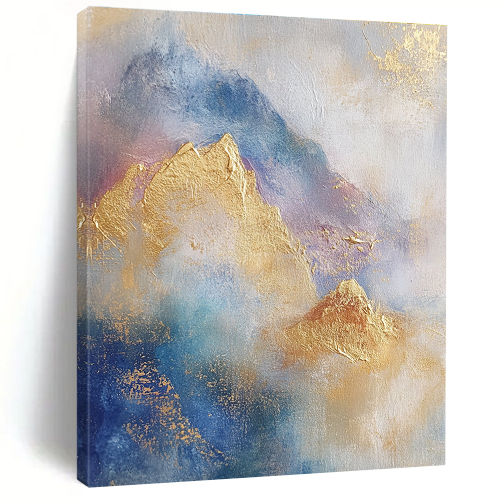 Large abstract painting featuring soft blue and gold tones with gilded mountains and textured brushstrokes for a striking visual impact.STSC446