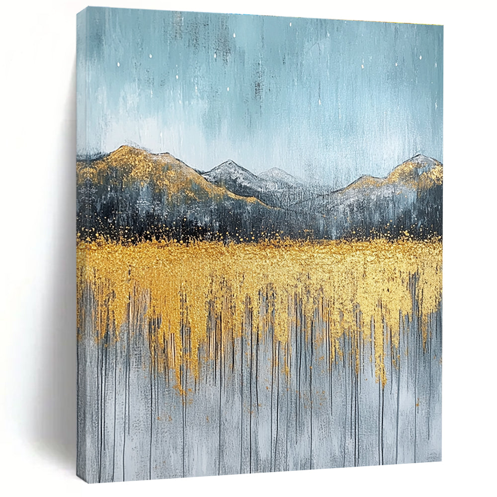 Large abstract painting with gold and silver on textured canvas featuring a serene sky golden mountains and soft gray grass.STSC097
