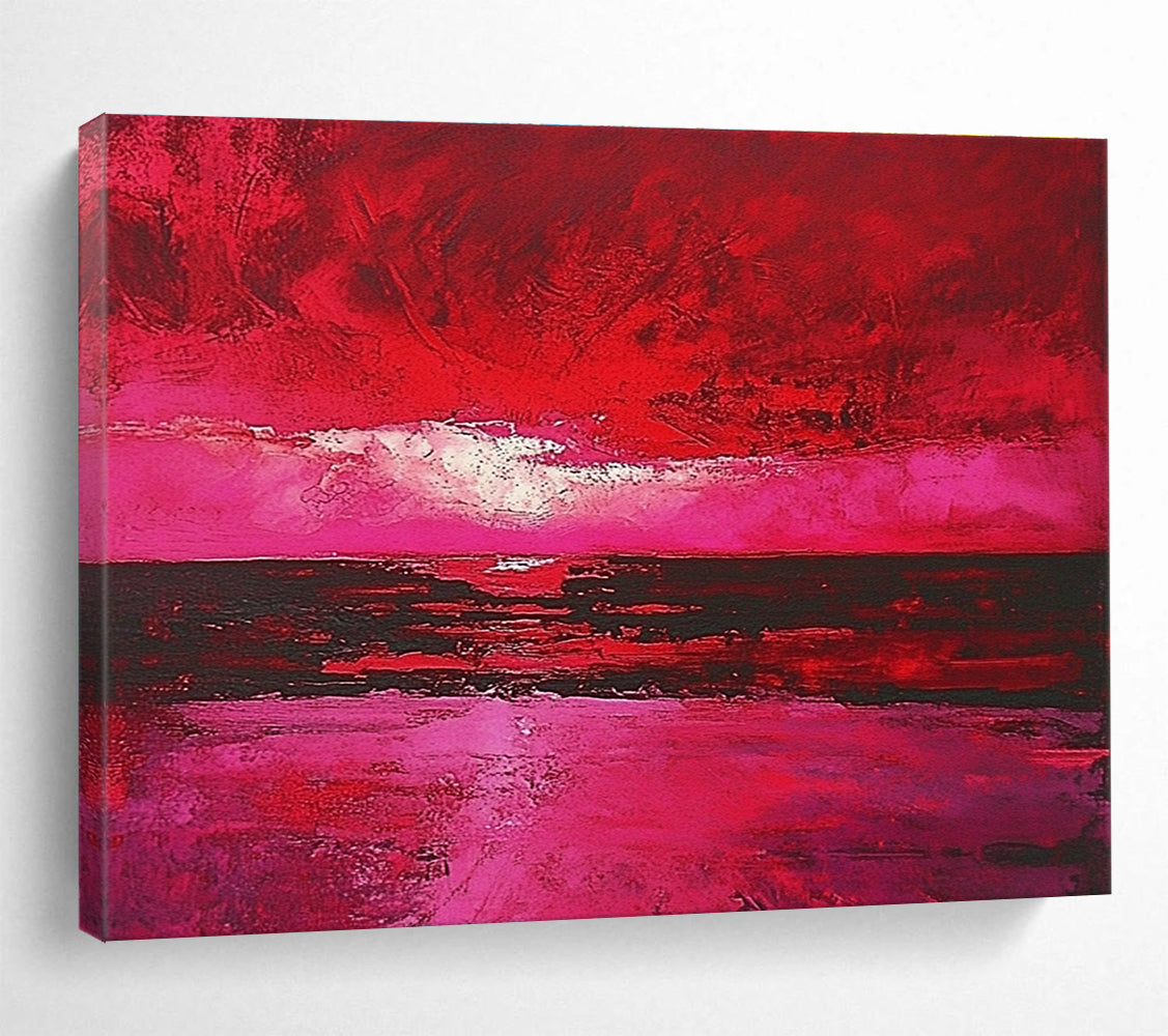 Large abstract painting depicting a red sky over the sea with hues of pink and crimson capturing the beauty of a sunset.SC273