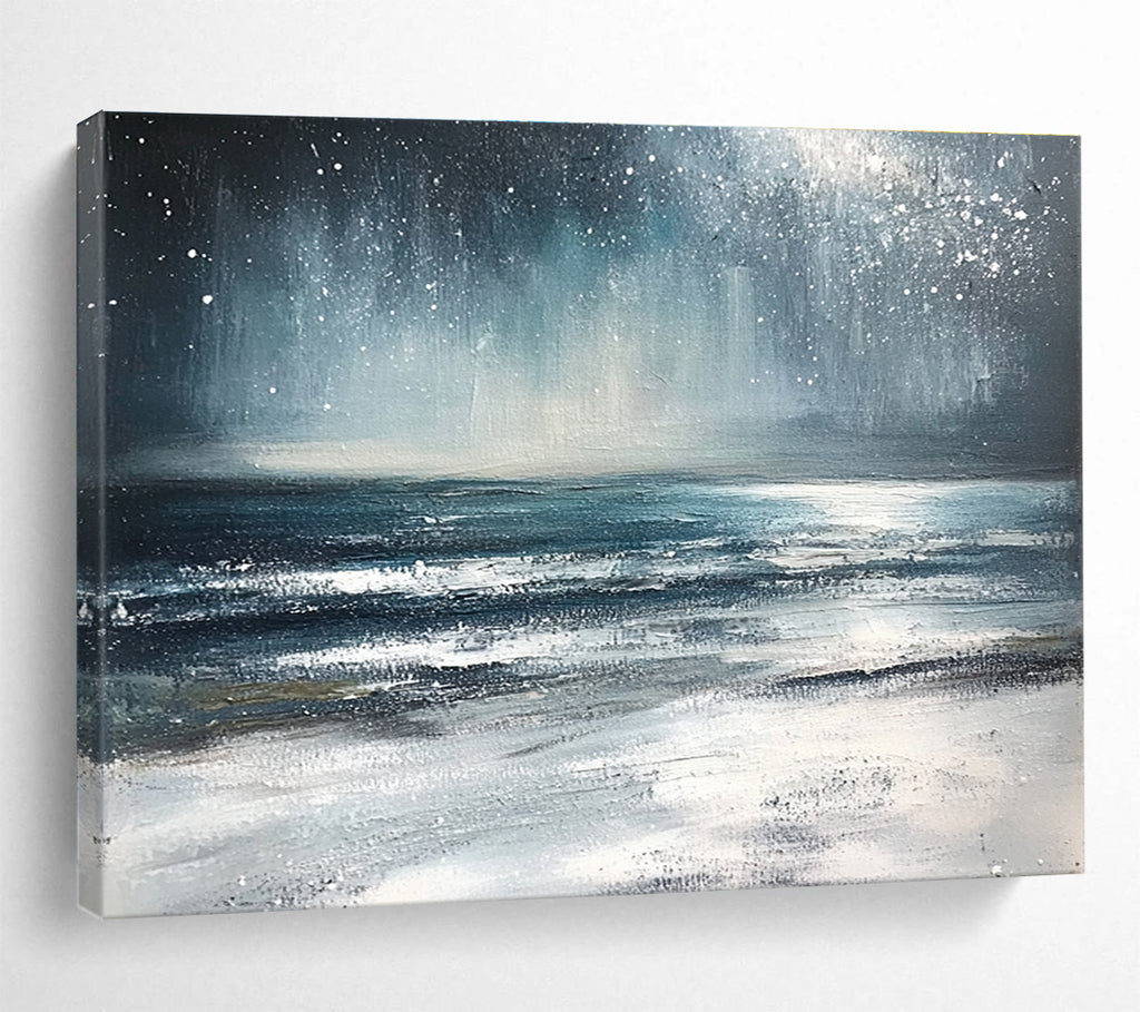 Large abstract painting depicting a winter ocean scene with dark blue and gray tones a starry white sky and sandy beach resembling snow.SC412