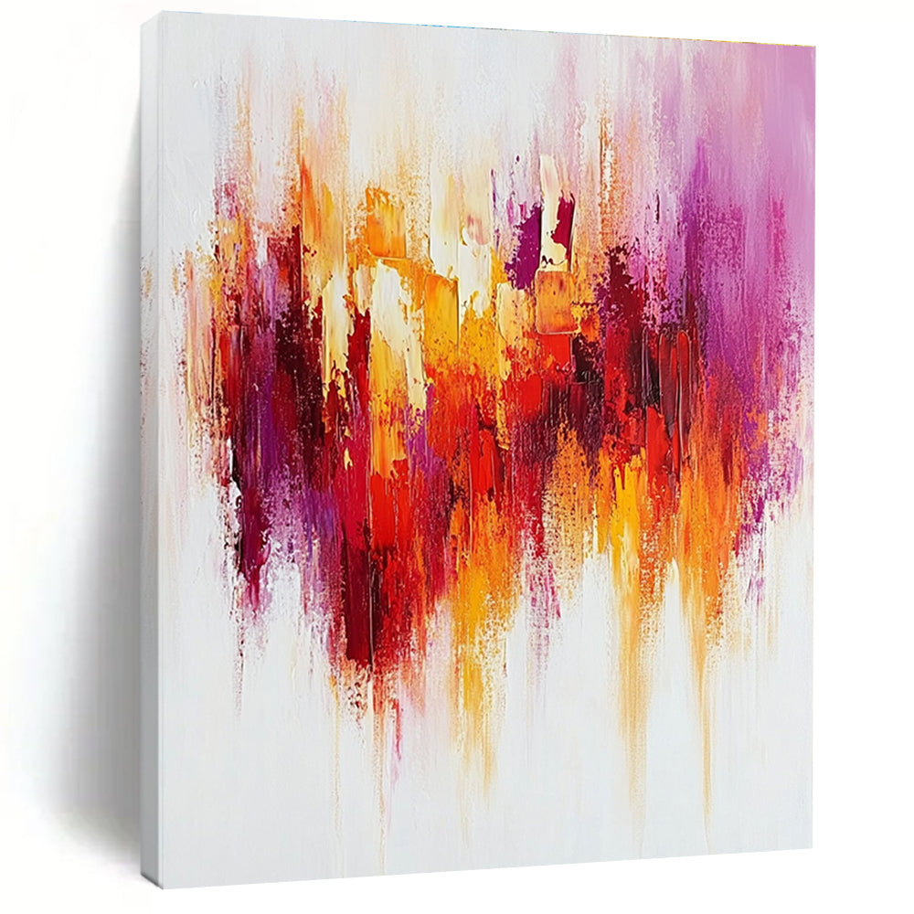 Large abstract painting with textured brush strokes in warm reds and yellows accented by purple on a white background creating a happy uplifting mood.STSC814