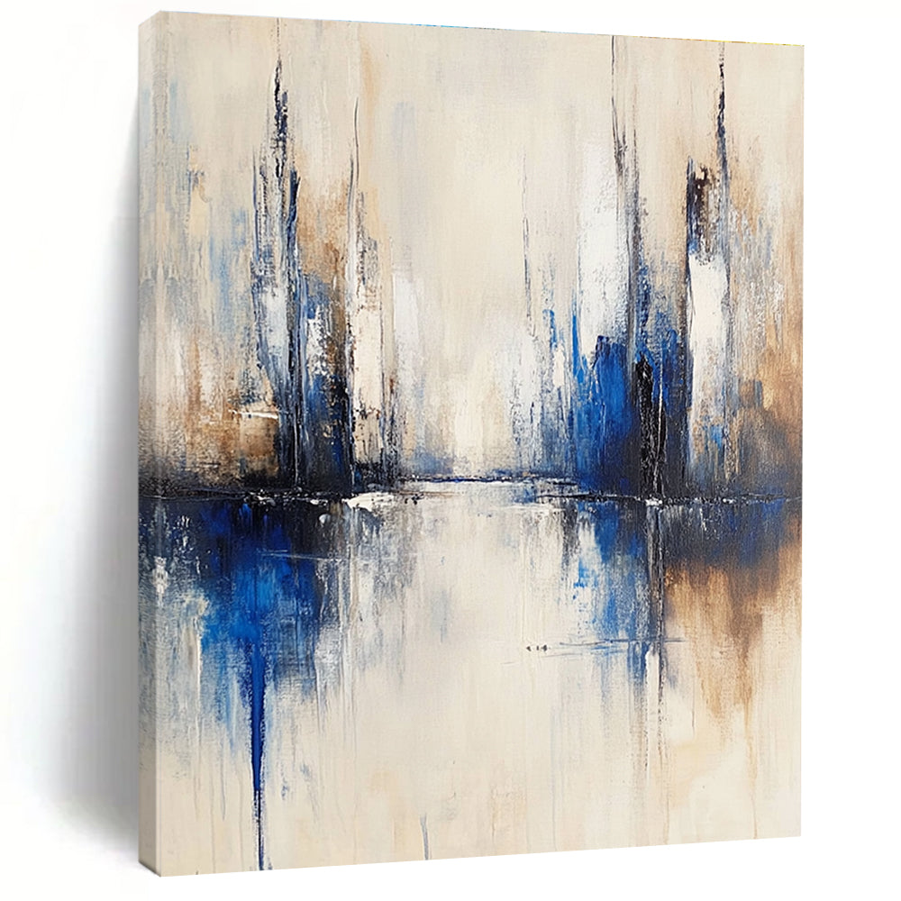 Large abstract painting of a city with muted white and blue tones on a beige background featuring blurred brush strokes reflecting in water.STSC134