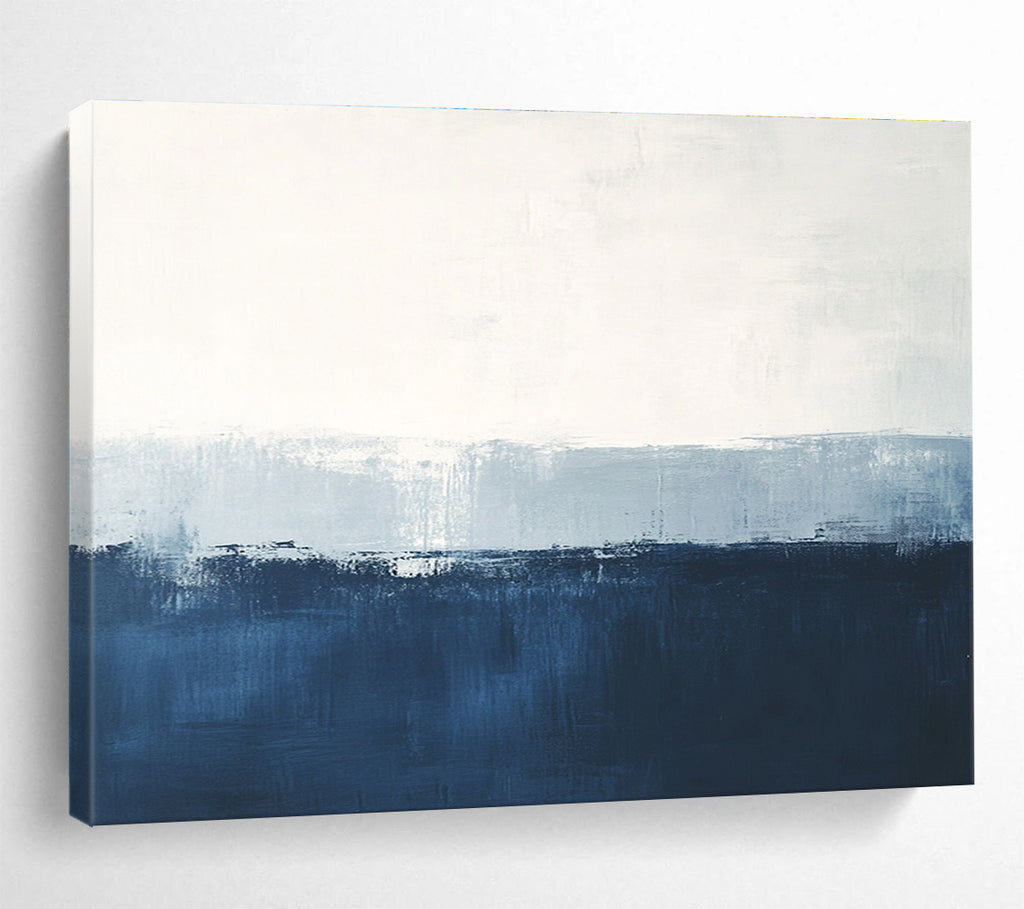 Large abstract painting in calming blue and white with subtle textures tranquil sea view soft edges and atmospheric skies.SC027