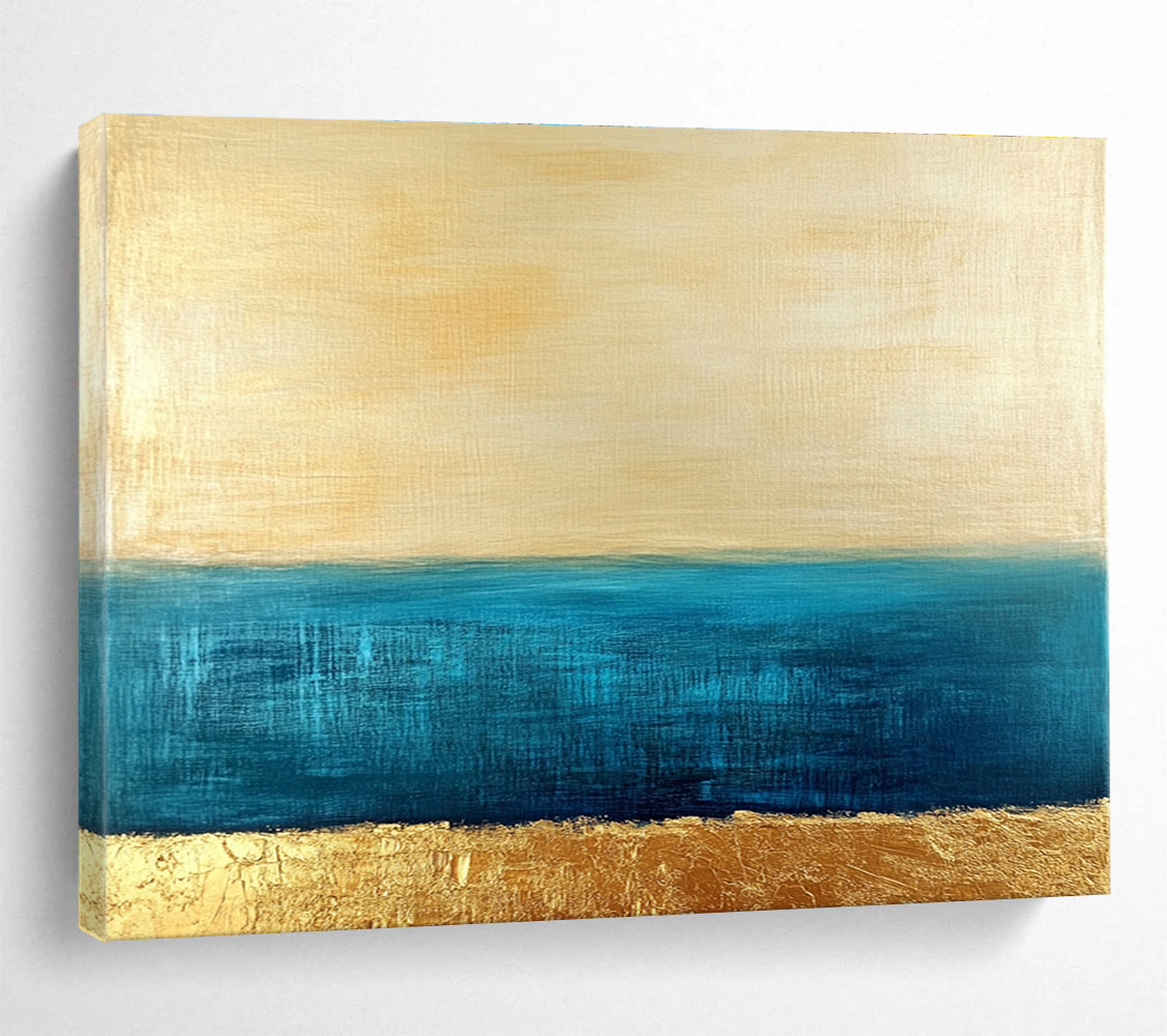 Large abstract painting featuring a golden sky and blue sea with textured gold accents and a soft minimalist aesthetic.SC172