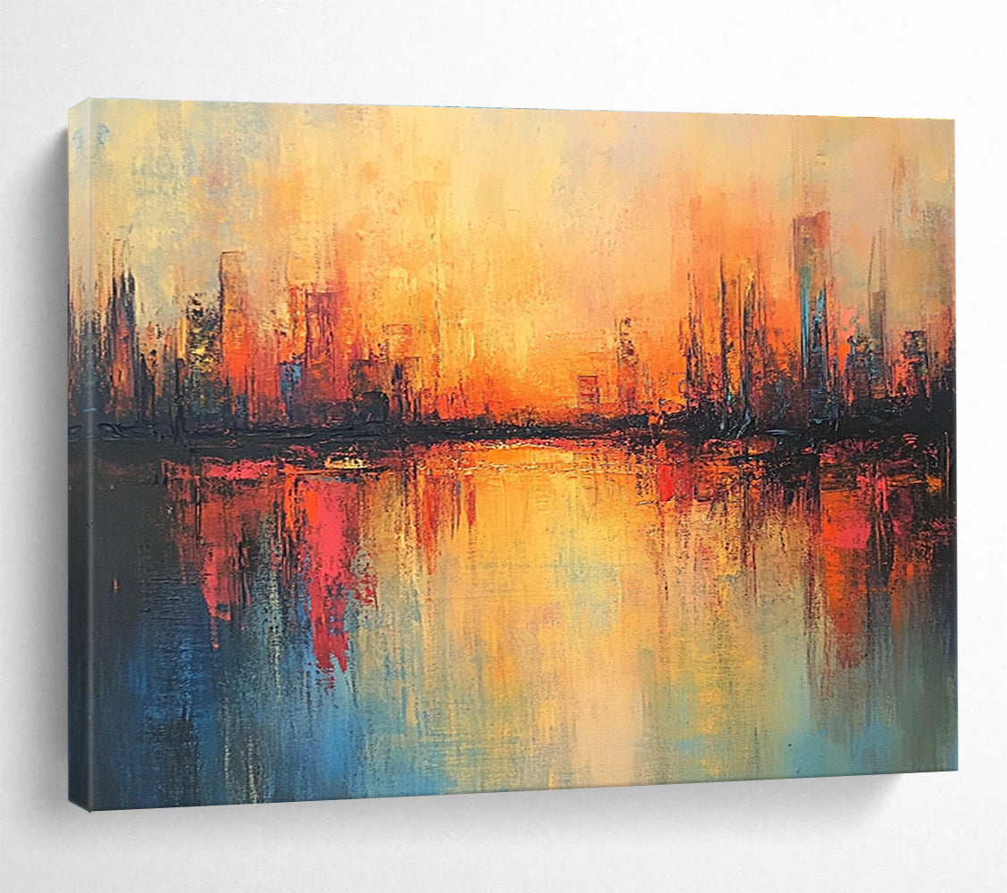 Large abstract painting featuring a cityscape in warm hues with soft brush strokes and reflections on calm waters, evoking a serene sunrise atmosphere.SC037