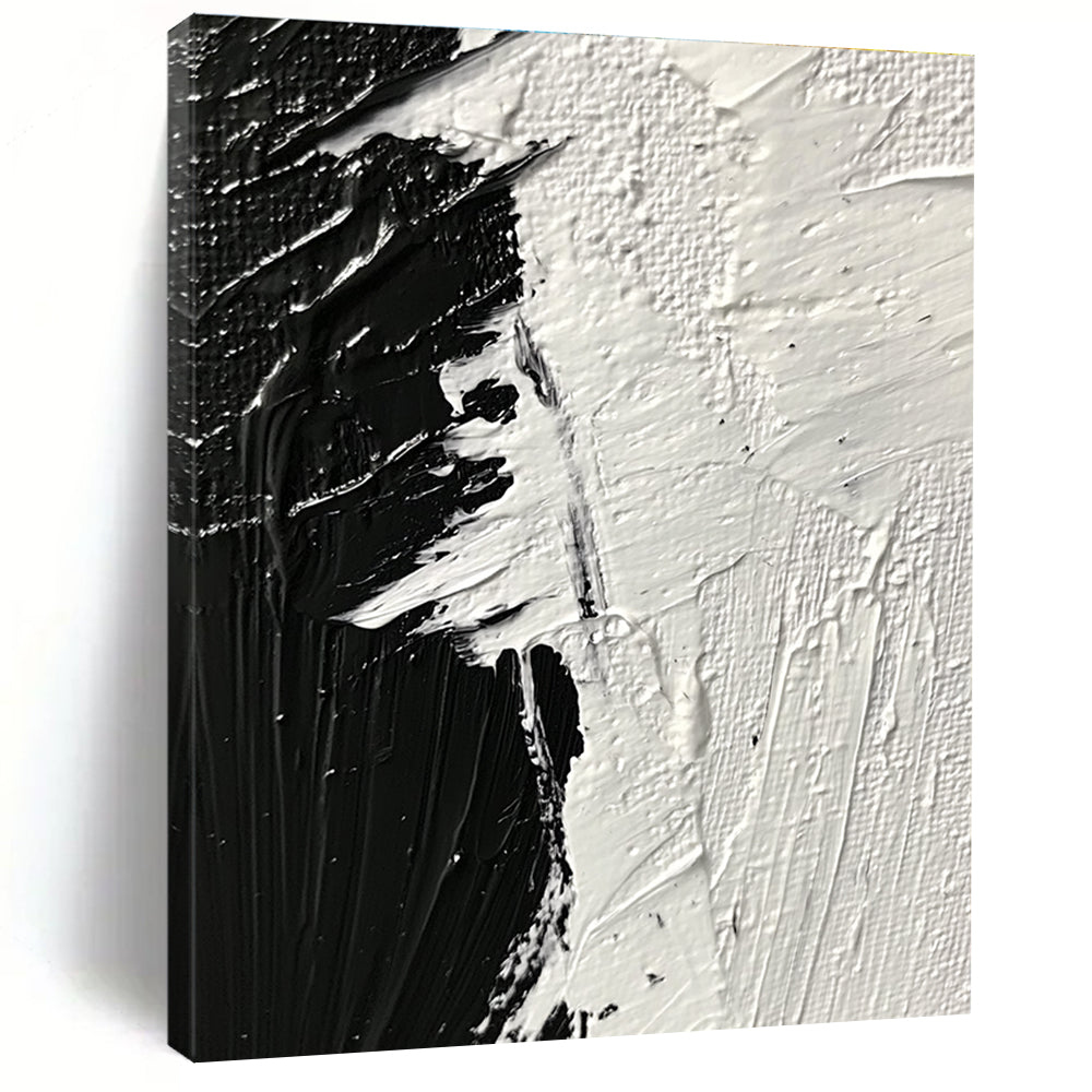 Large abstract painting featuring thick textured brushstrokes in striking black and white tones that evoke profound emotion and creativity.STSC1282
