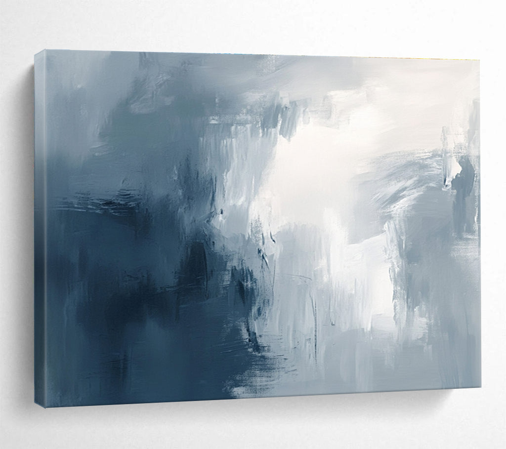 Large abstract painting with broad brush strokes in gray white and navy blue evoking calmness and introspection through soft gradients.SC048