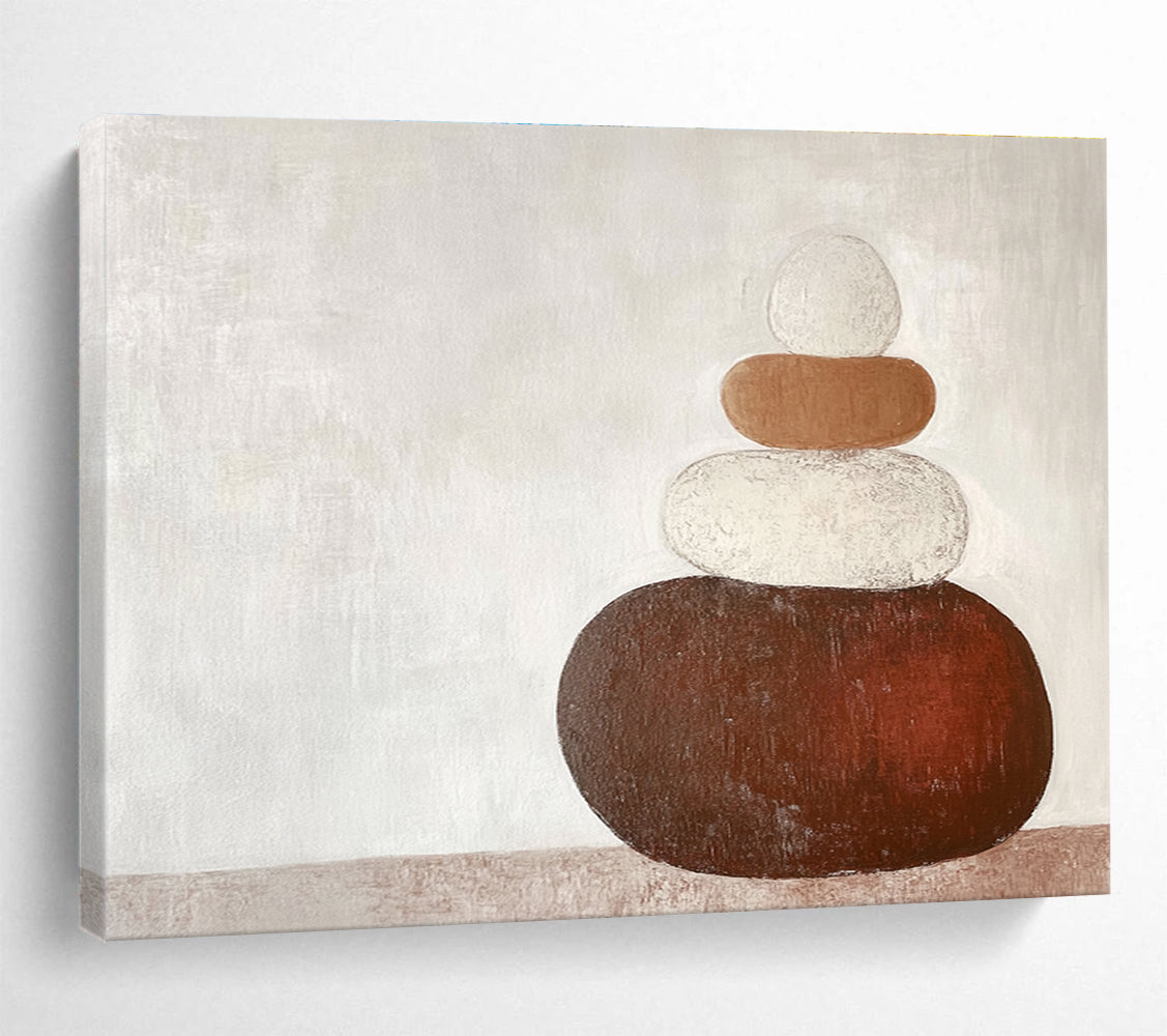 Large abstract painting in earth tones featuring three stacked rocks against a white background creating an elegant contrast.SC495