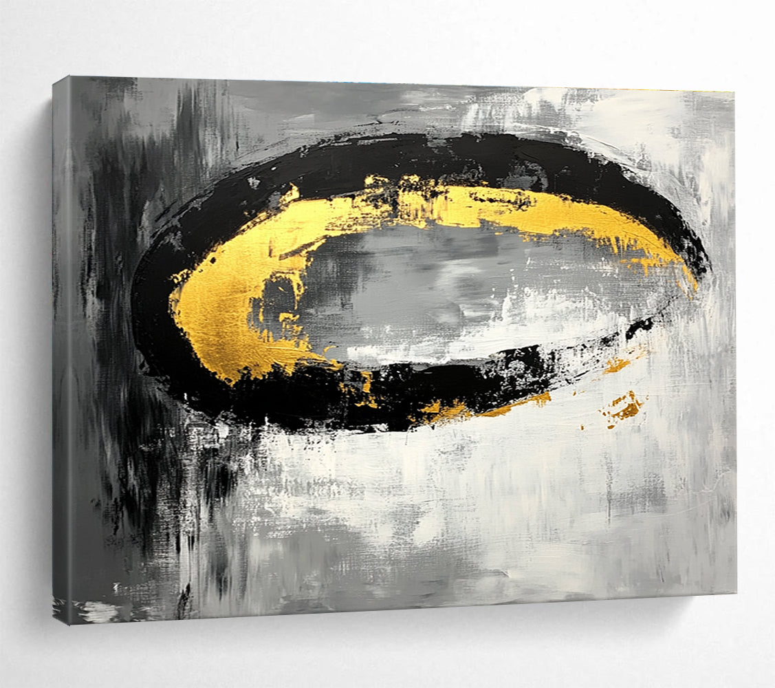 Large abstract painting featuring black white gray tones with gold accents and oval brush strokes on canvas.SC137