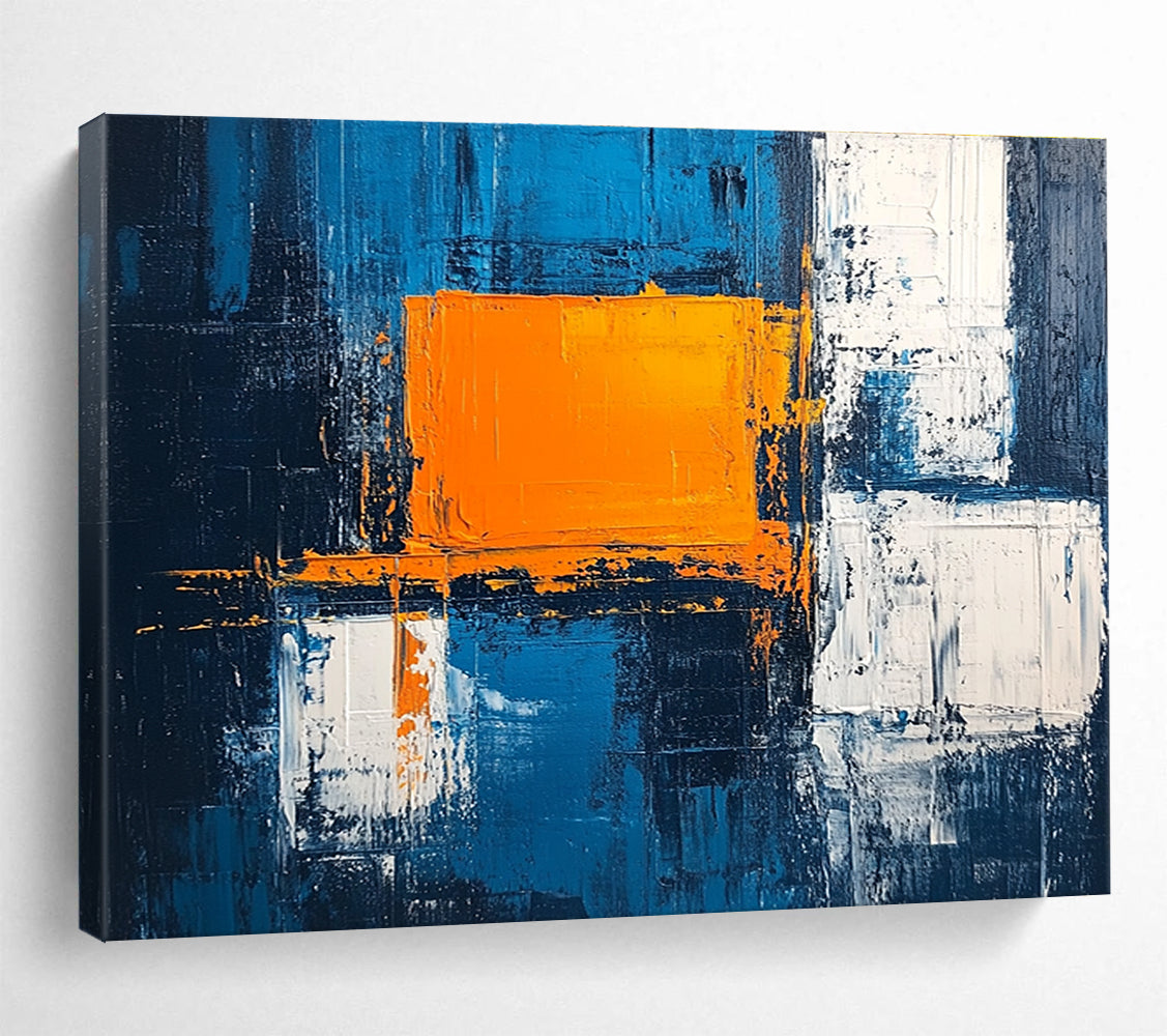 Large abstract painting featuring a textured pale blue background bold orange square white blocks and dark gray light indigo accents in acrylic.SC225