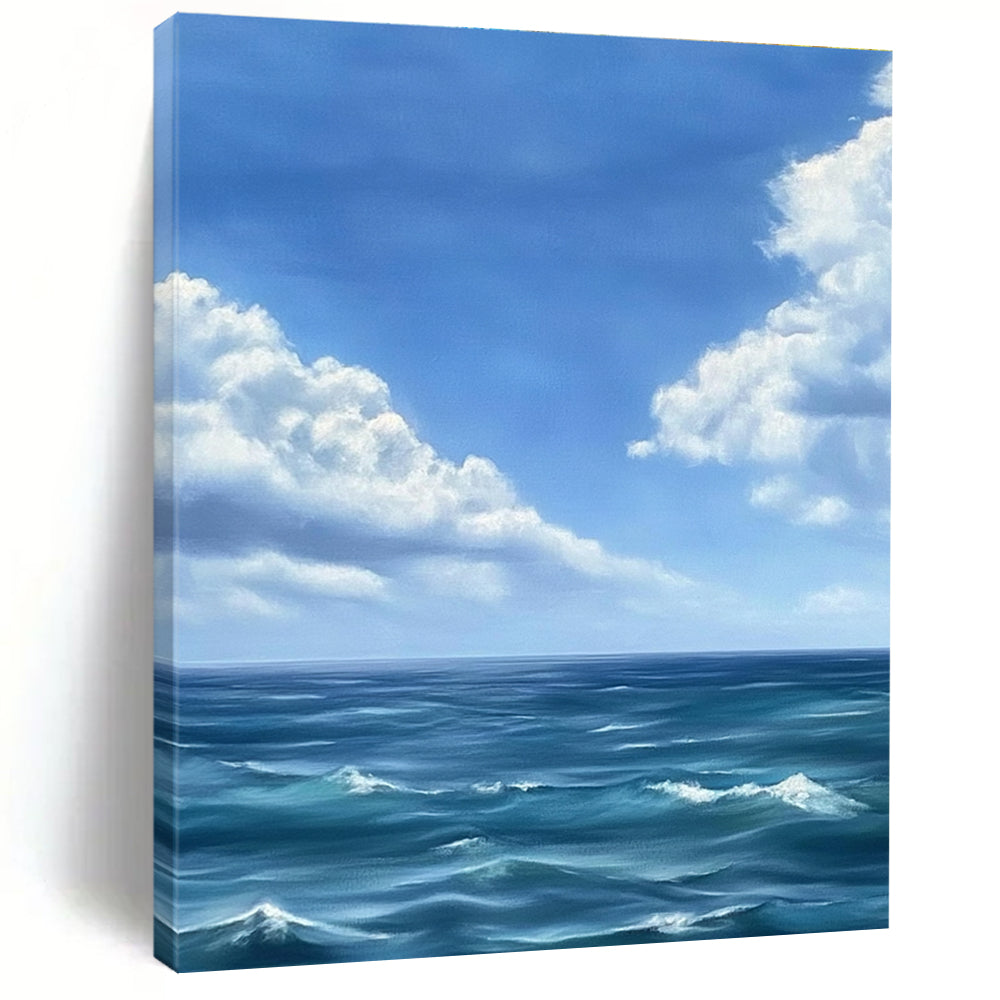 Large abstract painting depicting a tranquil ocean scene with gentle waves under a vast blue sky and soft white clouds in Monet's style.STSC1215