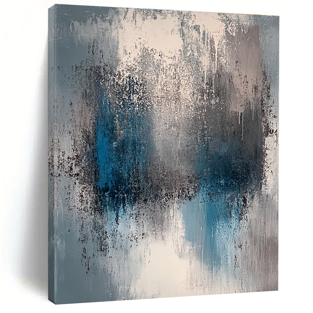 A large abstract painting featuring a faded gray and blue color palette with soft lighting and neutral tones.STSC577