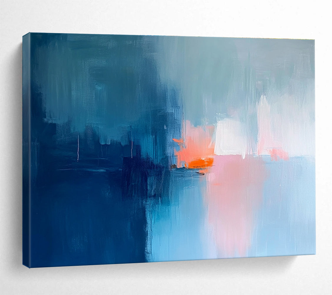 Large abstract painting in soft blue tones with pink and orange accents creates a serene mood through expressive brush strokes and blurred edges.SC253