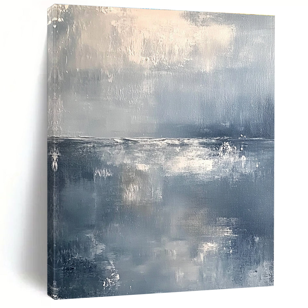 Large abstract painting of a serene ocean horizon in muted gray and white tones with soft brushstrokes conveying tranquility and elegance.STSC262