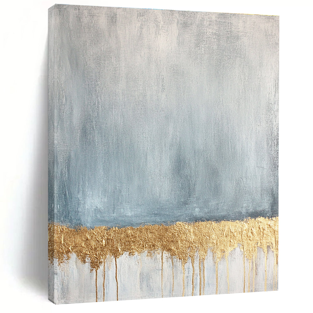 Large abstract painting featuring a textured pale blue and gold palette with a gold metallic foil line across a soft grey and white background.STSC571