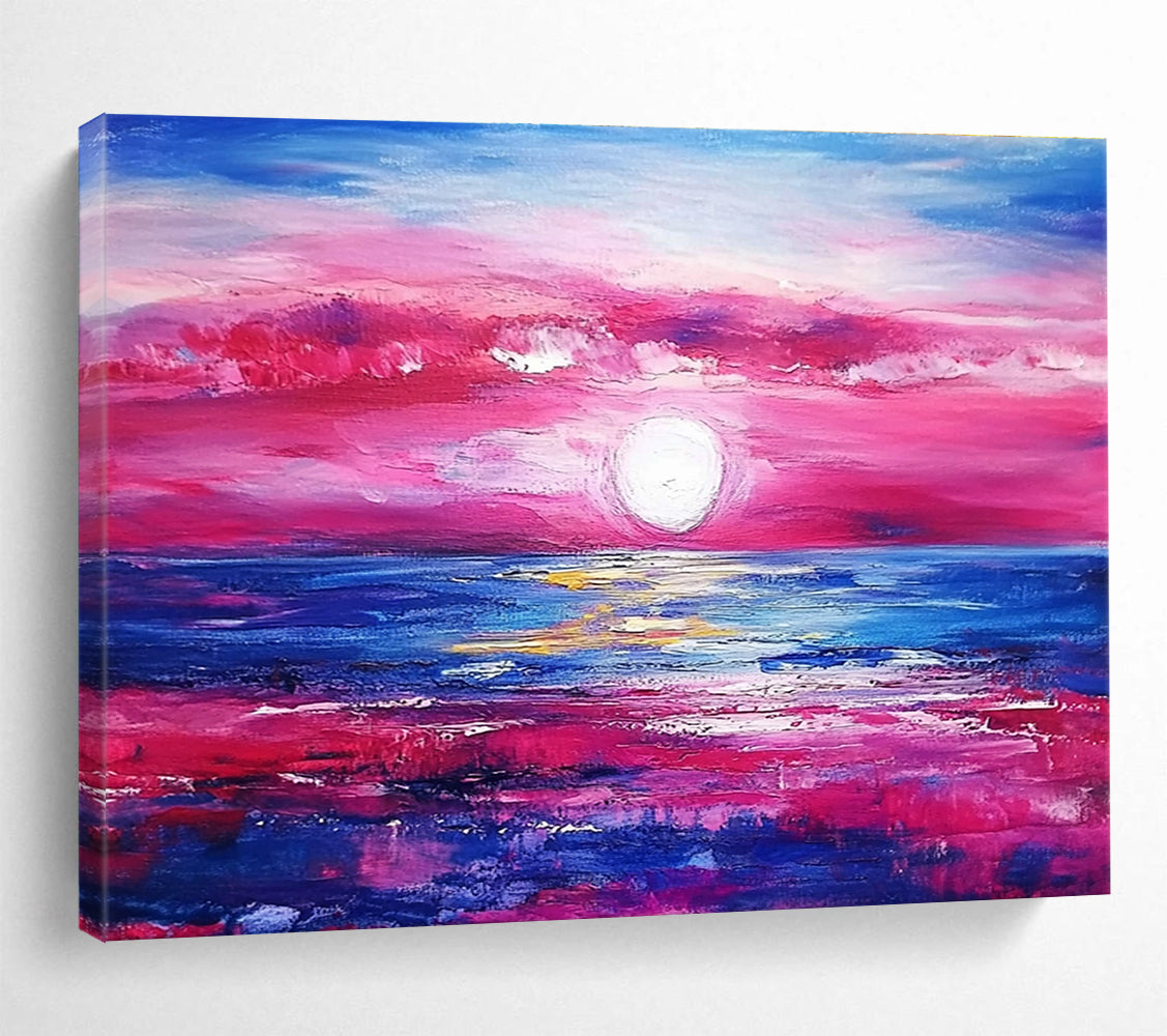 A large abstract painting featuring a pink and blue sunset over the ocean with purple and red clouds by artist Anna Bocek.SC537