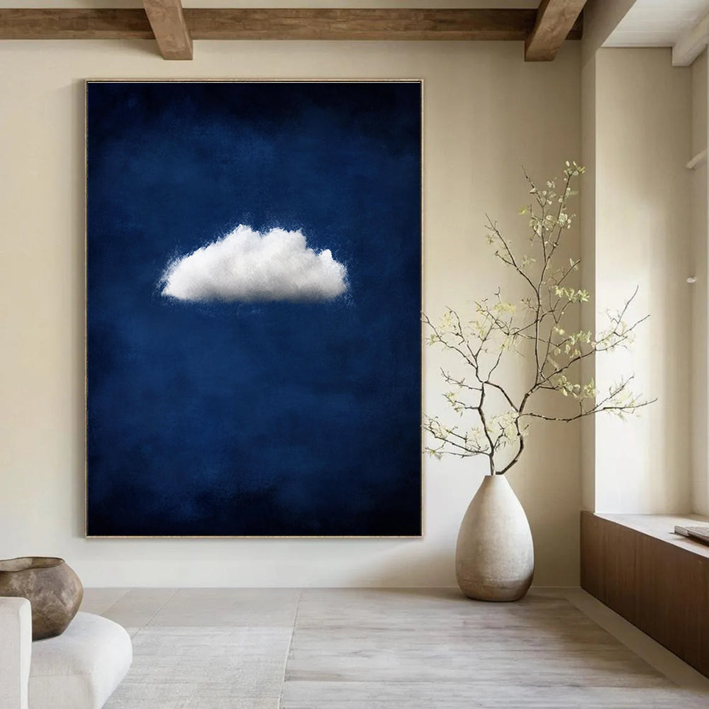Large abstract artwork featuring a small white cloud on a dark blue backdrop creating a moody and atmospheric minimalist design.STSC1404