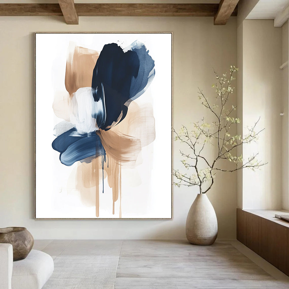 Large abstract painting featuring calming brushstrokes in navy blue and beige on a white background creating emotional shapes and a sense of balance.STSC1325