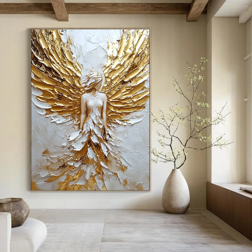 Large abstract painting of an angel with golden wings on textured canvas showcasing a white and gold color palette.STSC142
