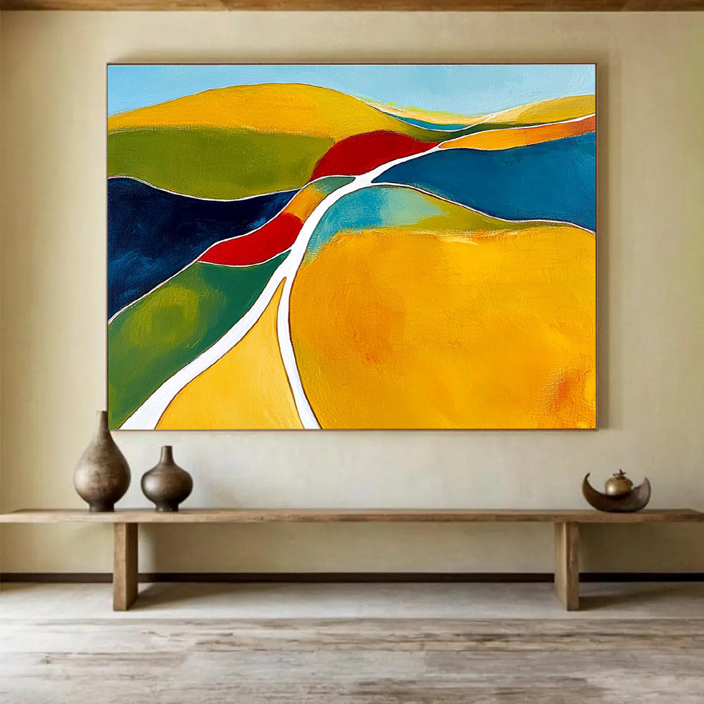 Large abstract painting featuring organic shapes in yellow and green with white lines contrasted against dark blue light red and clear sky blue.SC069