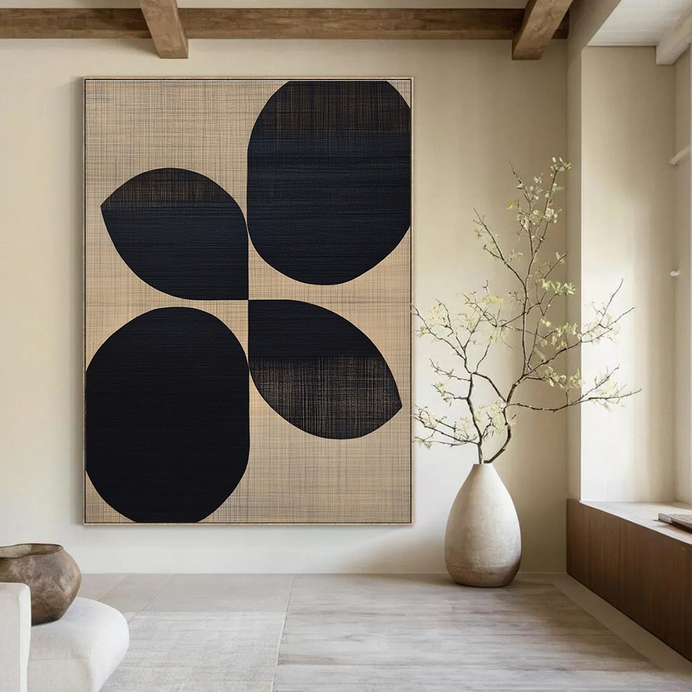 Large abstract painting featuring black oval shapes on a beige wood grain background reflecting midcentury modern organic design.STSC312