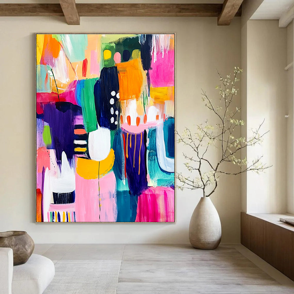 A large abstract painting bursting with vibrant colors and dynamic shapes representing happiness creativity and playful celebration in an art gallery setting.STSC1219