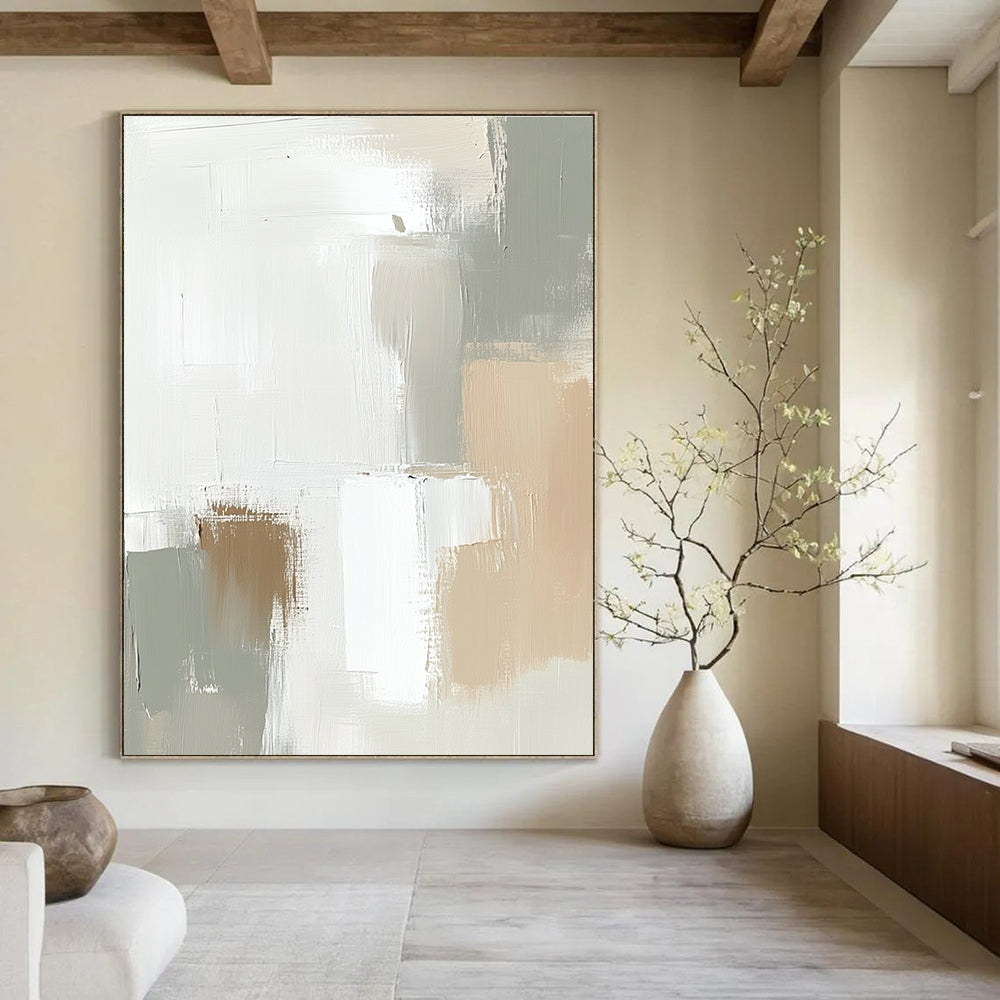 Large abstract painting in soft tones of white and beige featuring soft strokes and neutral shapes that blend harmoniously.STSC379