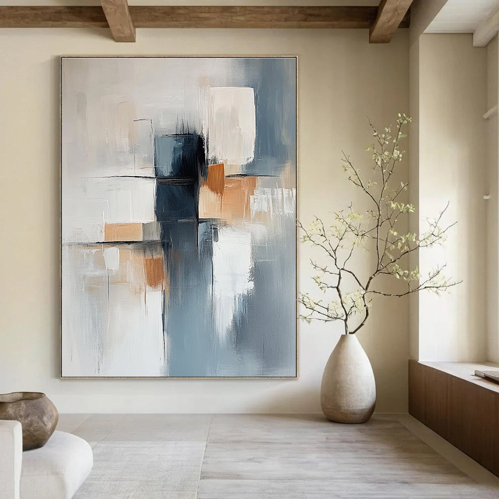 Large abstract painting featuring a light blue and gray background with soft lines and elegant white shapes complemented by dark blocks and warm accents.STSC400
