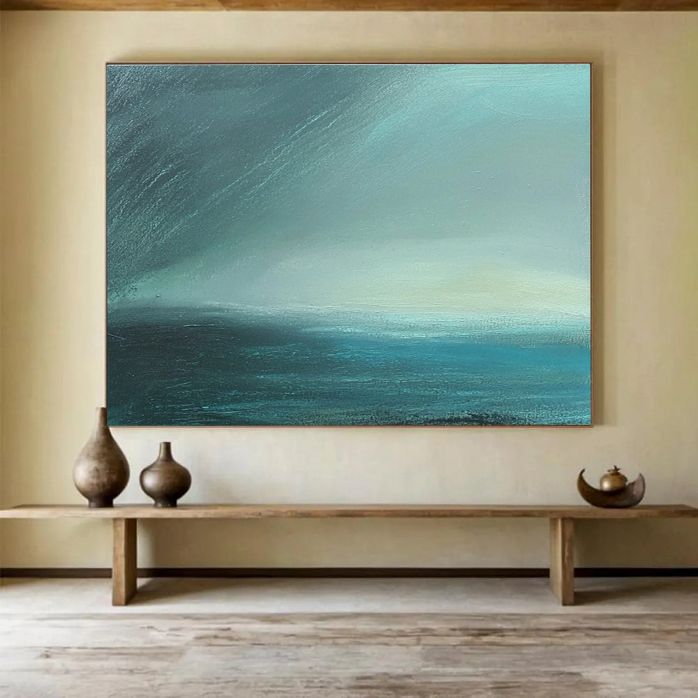Large abstract painting in impasto technique featuring blue-green sea tones with fog and dark sky using thick, muted layers for atmospheric depth.SC497