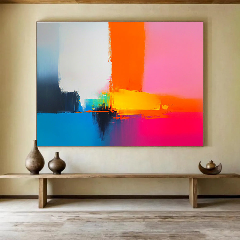 A large abstract painting featuring bold shapes and clean lines in pink orange blue yellow and white inspired by Peter Wileman's brushstrokes.SC505