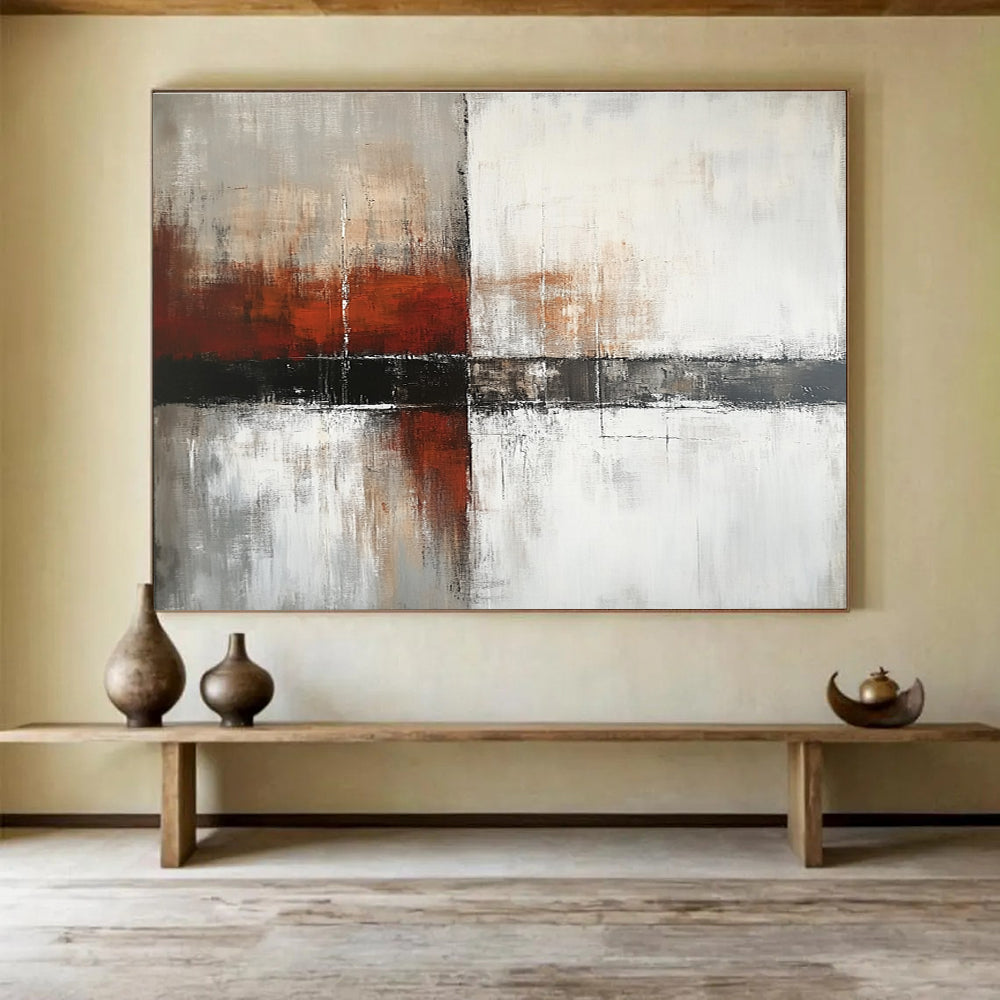 Large abstract painting with a calming color palette of white gray and soft tones featuring dark red orange brushstrokes and textured layers.SC592