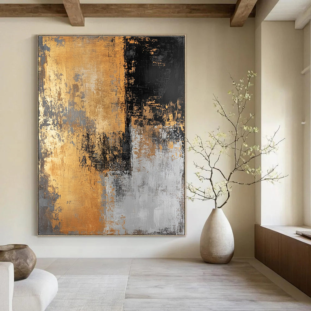 Large abstract painting in golden black and gray hues creates a striking visual impact perfect for modern decor.STSC576