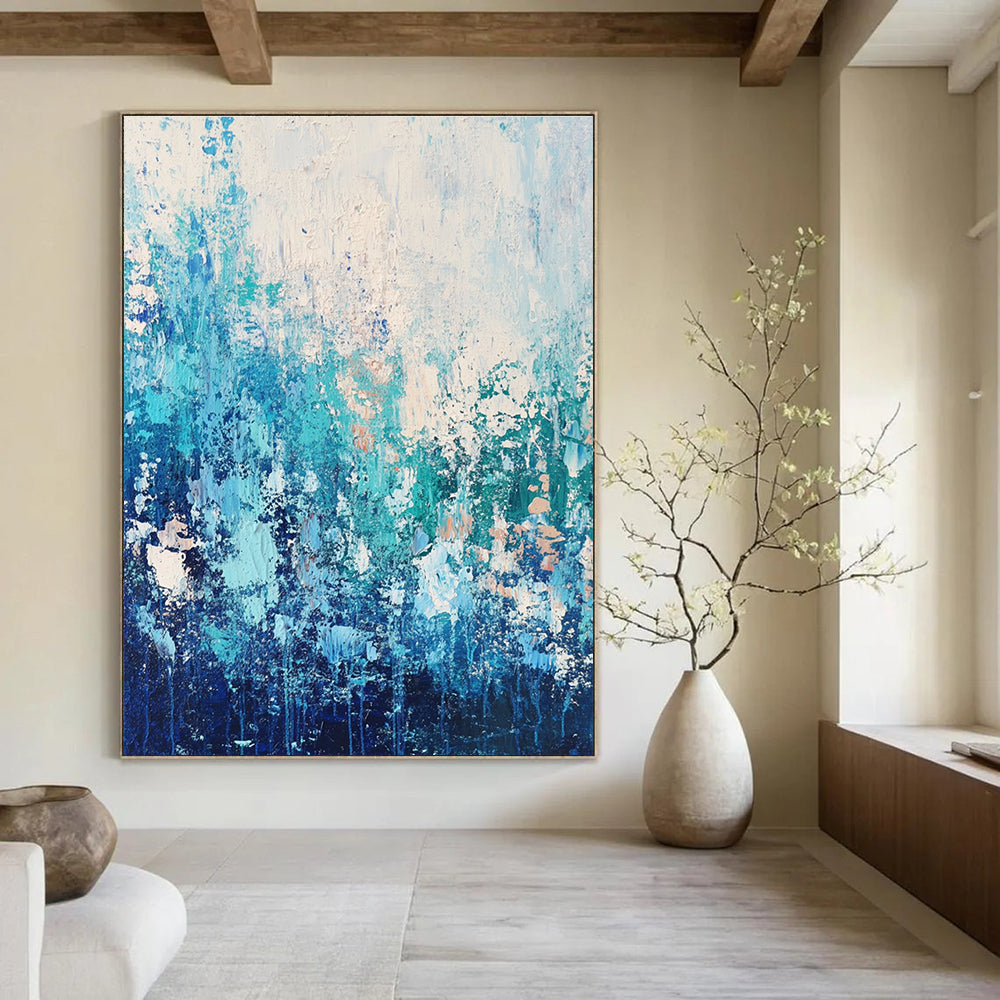 Large abstract painting featuring water and sky-inspired colors with a paint-dripping technique that evokes movement and depth.STSC452