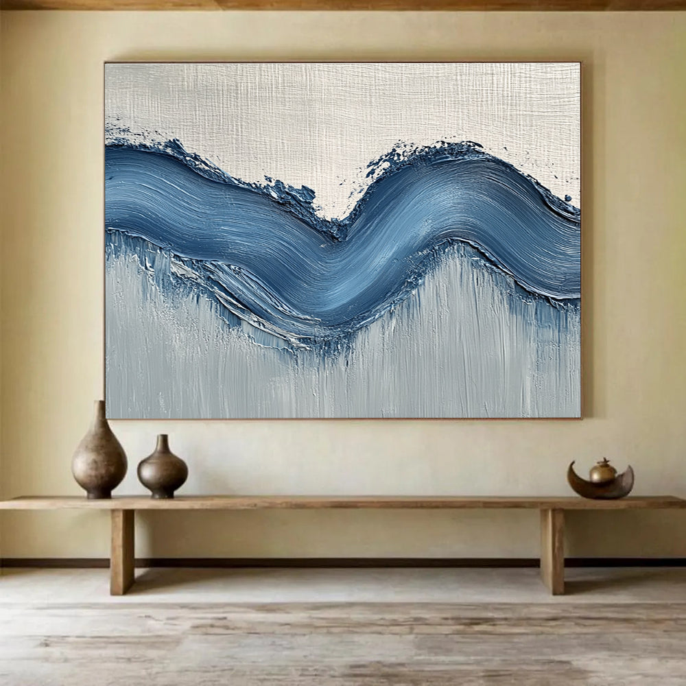 Large abstract painting with gentle blue hills on light gray wall, showcasing depth and movement for a modern aesthetic.SC453